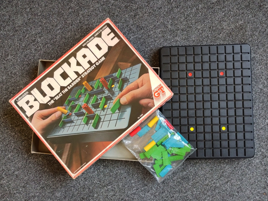 Blockcade Game box and components